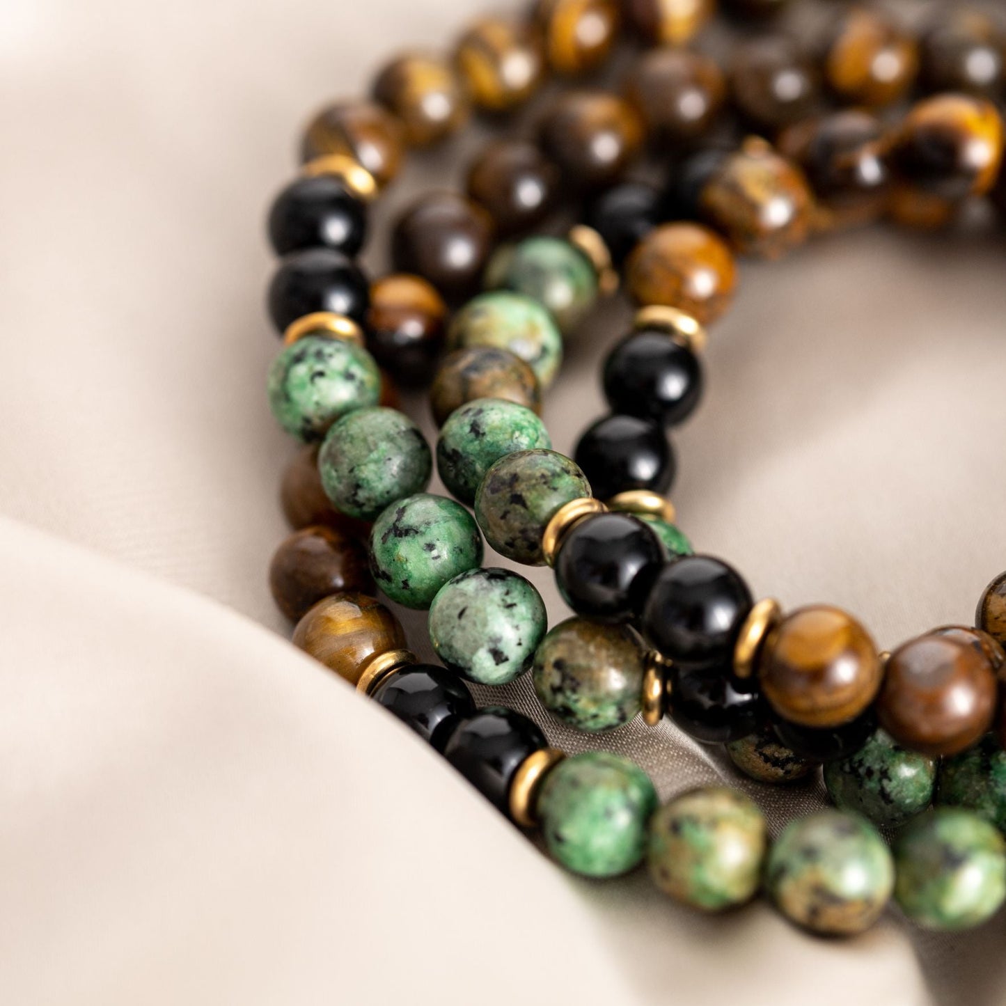 Tibetische Mala-Halskette – Tigerauge und Onyx – türkisfarbene Quaste